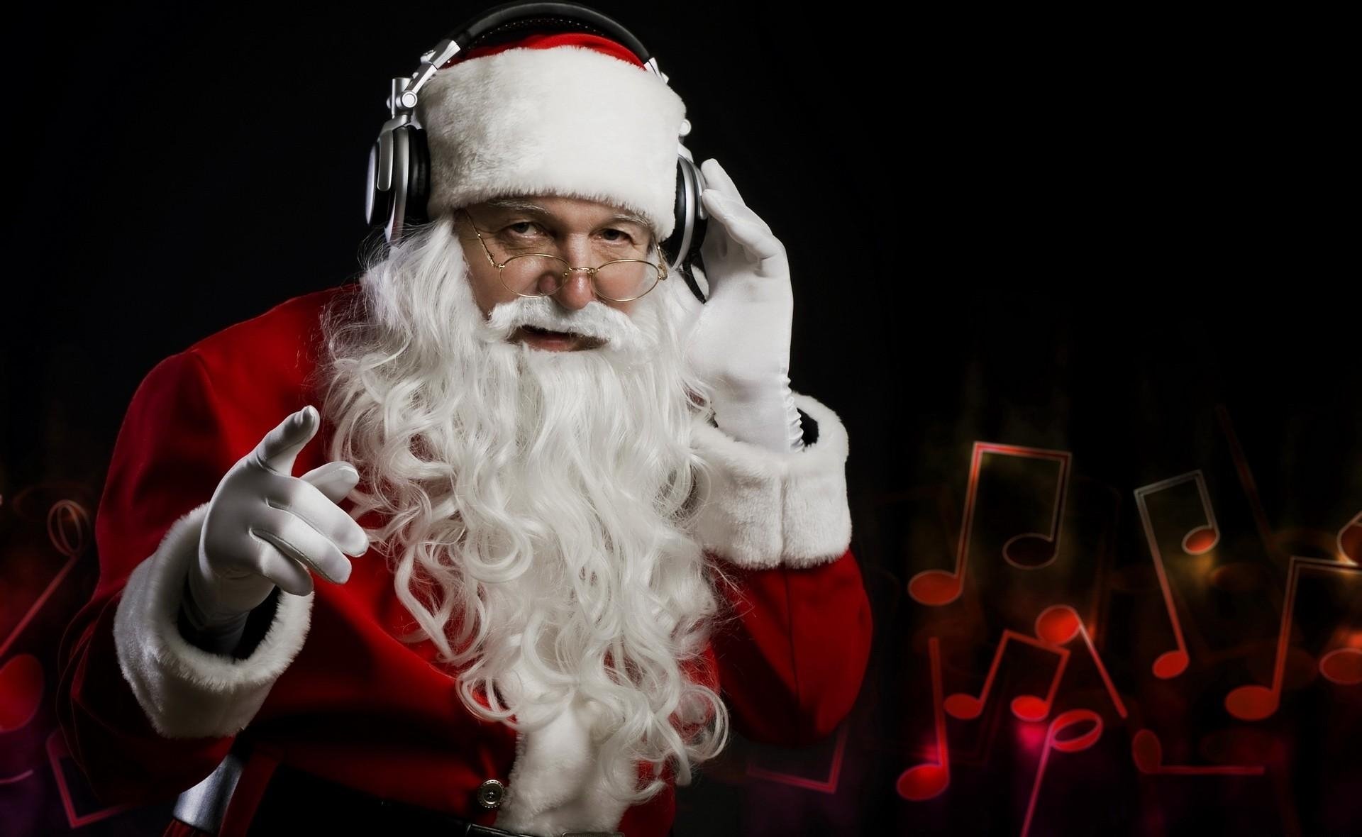 Santa-Claus-Christmas-Headphones-Music-Hand.jpg