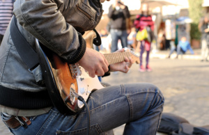 guitar player fender stratocaster