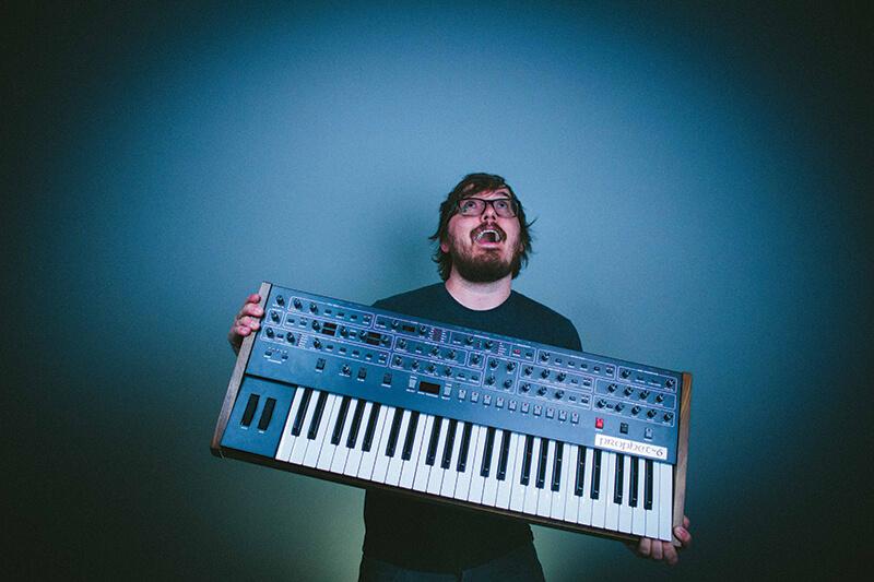 Kyle Andrews with Prophet-6 synth