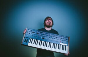 Kyle Andrews with Prophet-6 synth